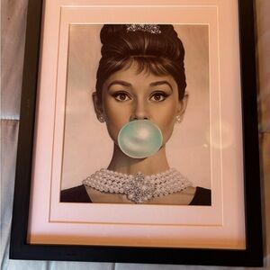 Chic Black Framed Art Print with Iconic Portrait